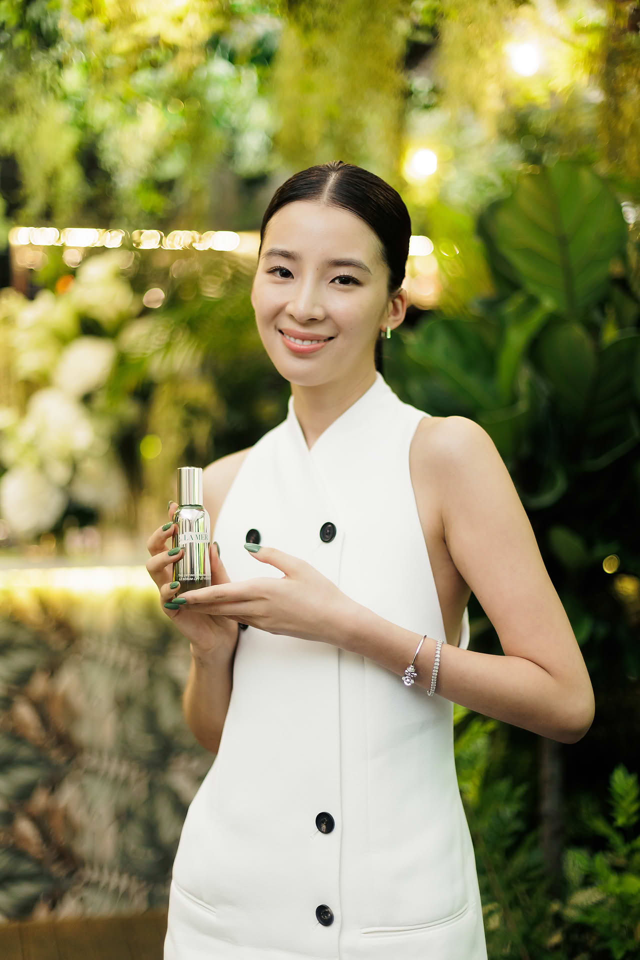 Influencer posing with a product at La Mer WCD