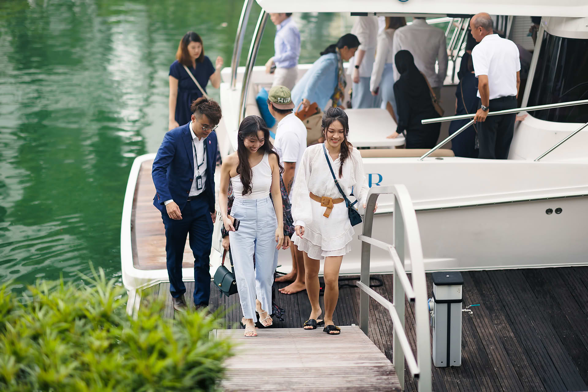 Guests arriving with a private yatch at La Mer PR event in Sentosa