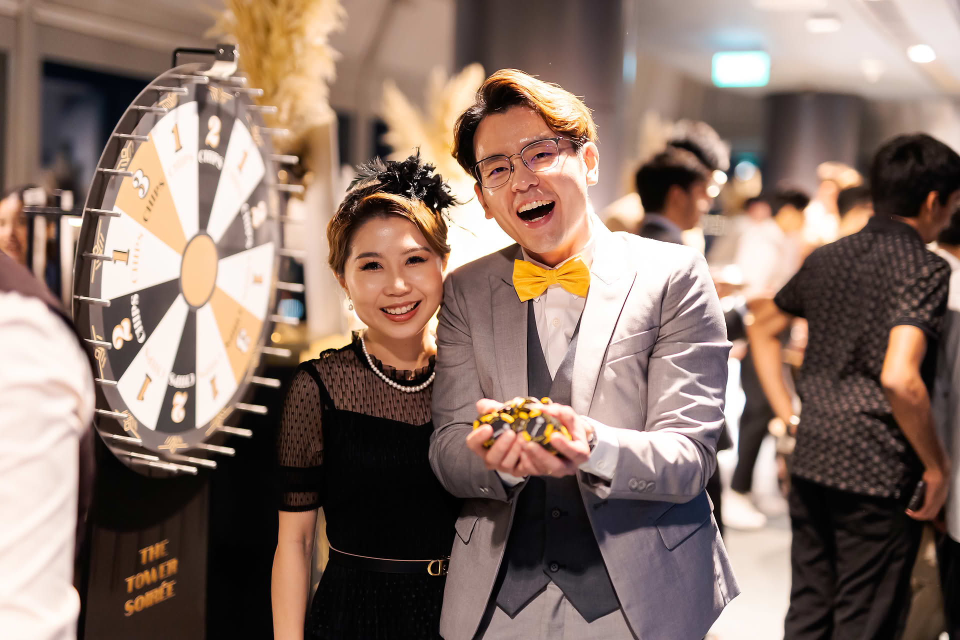 Couple showing their prize money