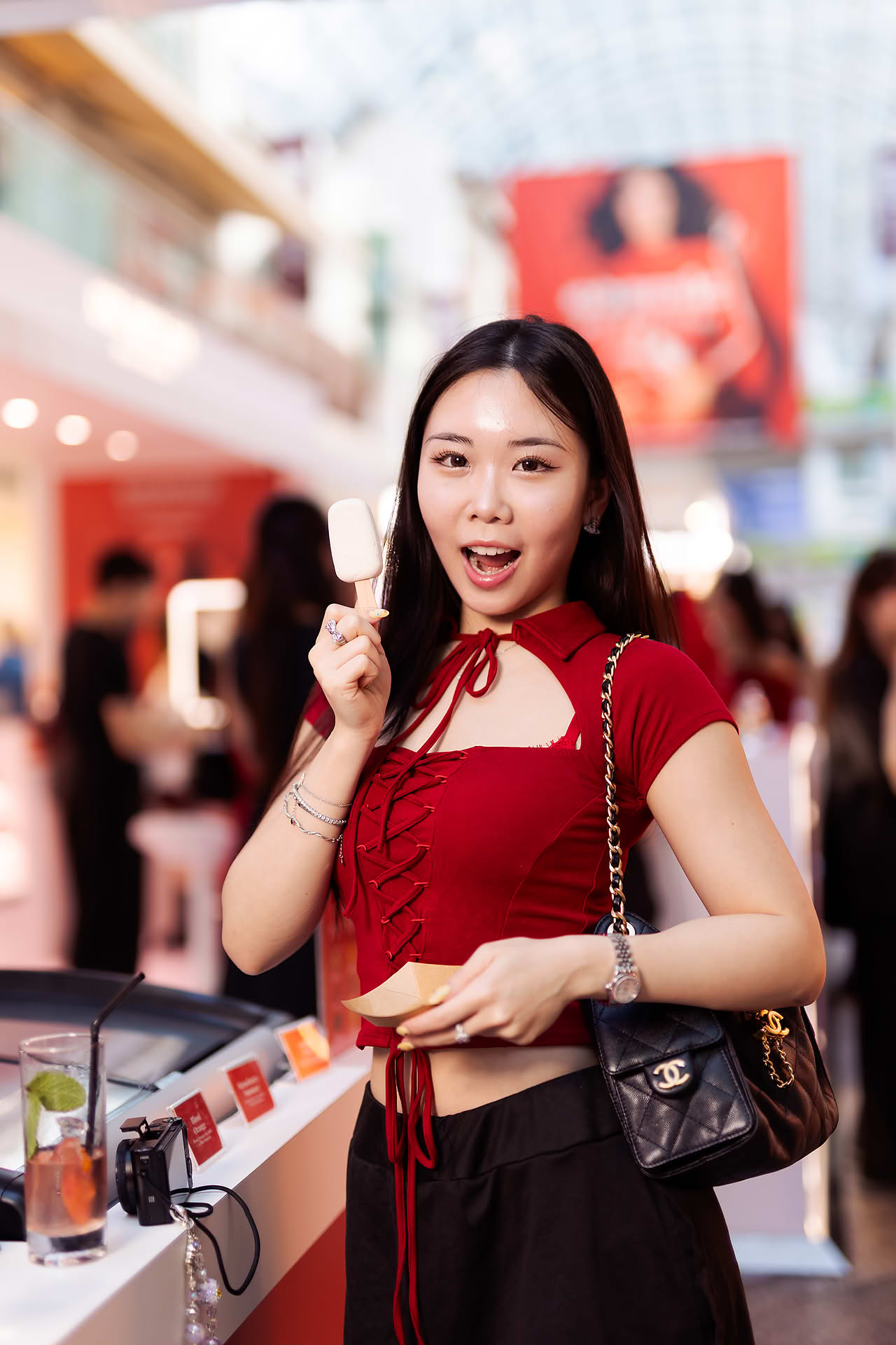 Influencers showing ice cream at Kylie Cosmetics pop-up stall in Bugis Junction