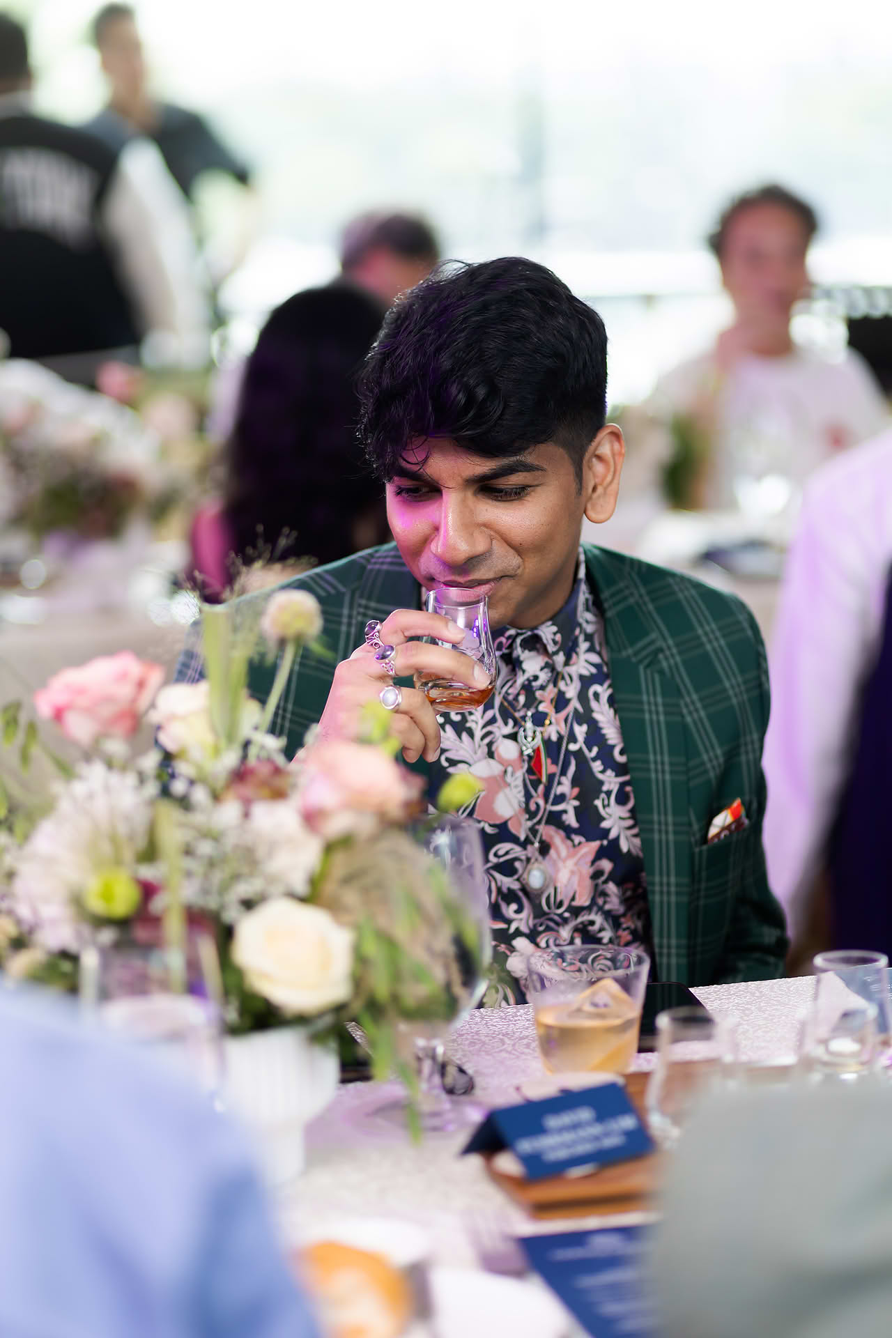Guest drinking at Glenglassaugh PR event