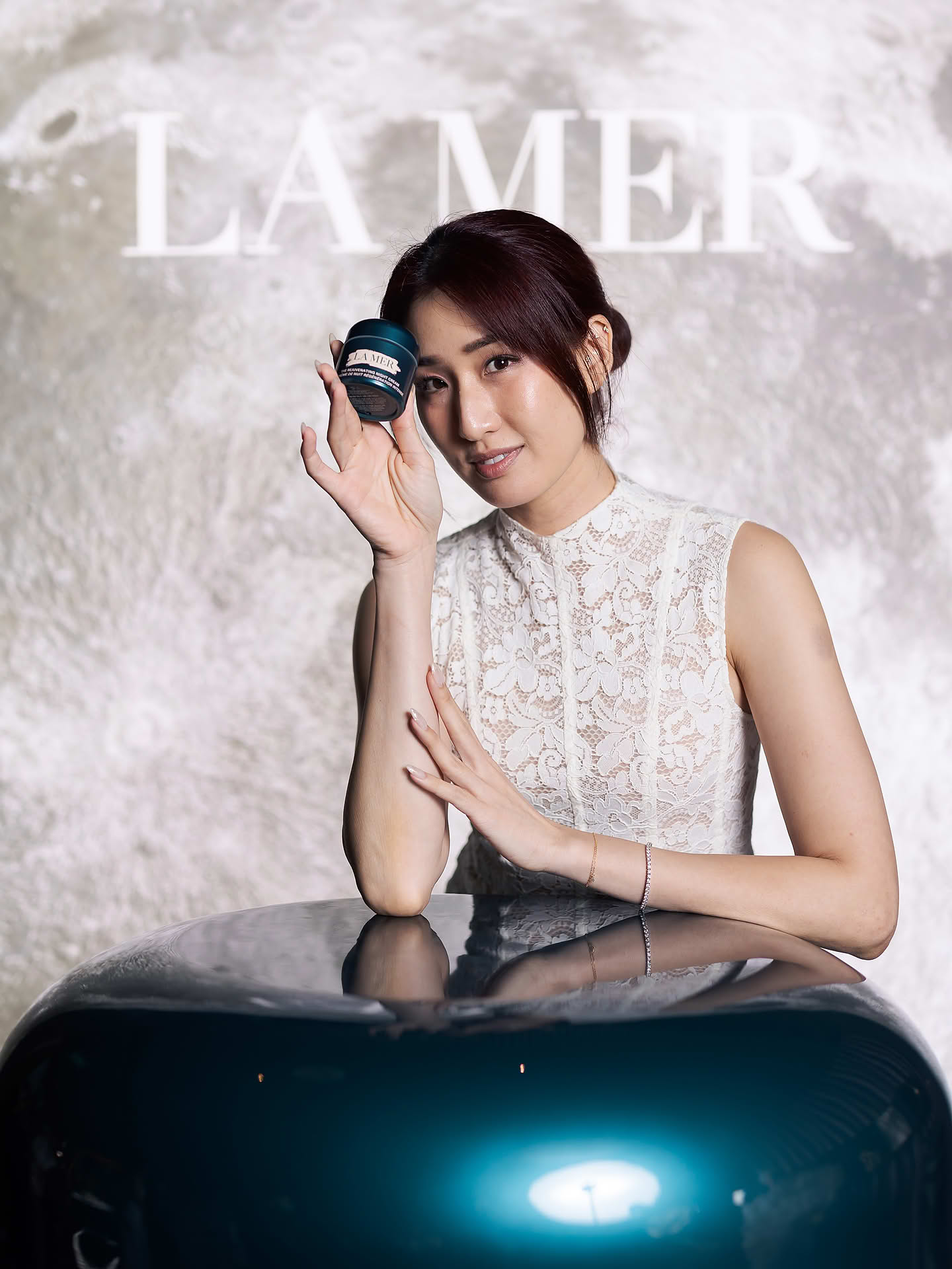Celebrity posing with product at La Mer One Night event