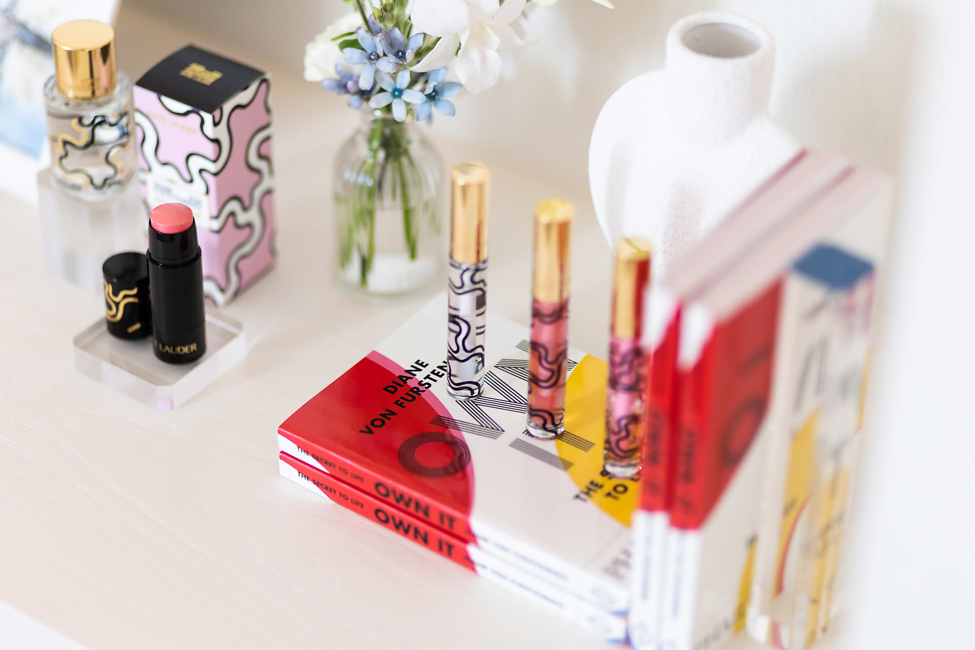 Products on display at Diane von Furstenberg x Estee Lauder lunch event