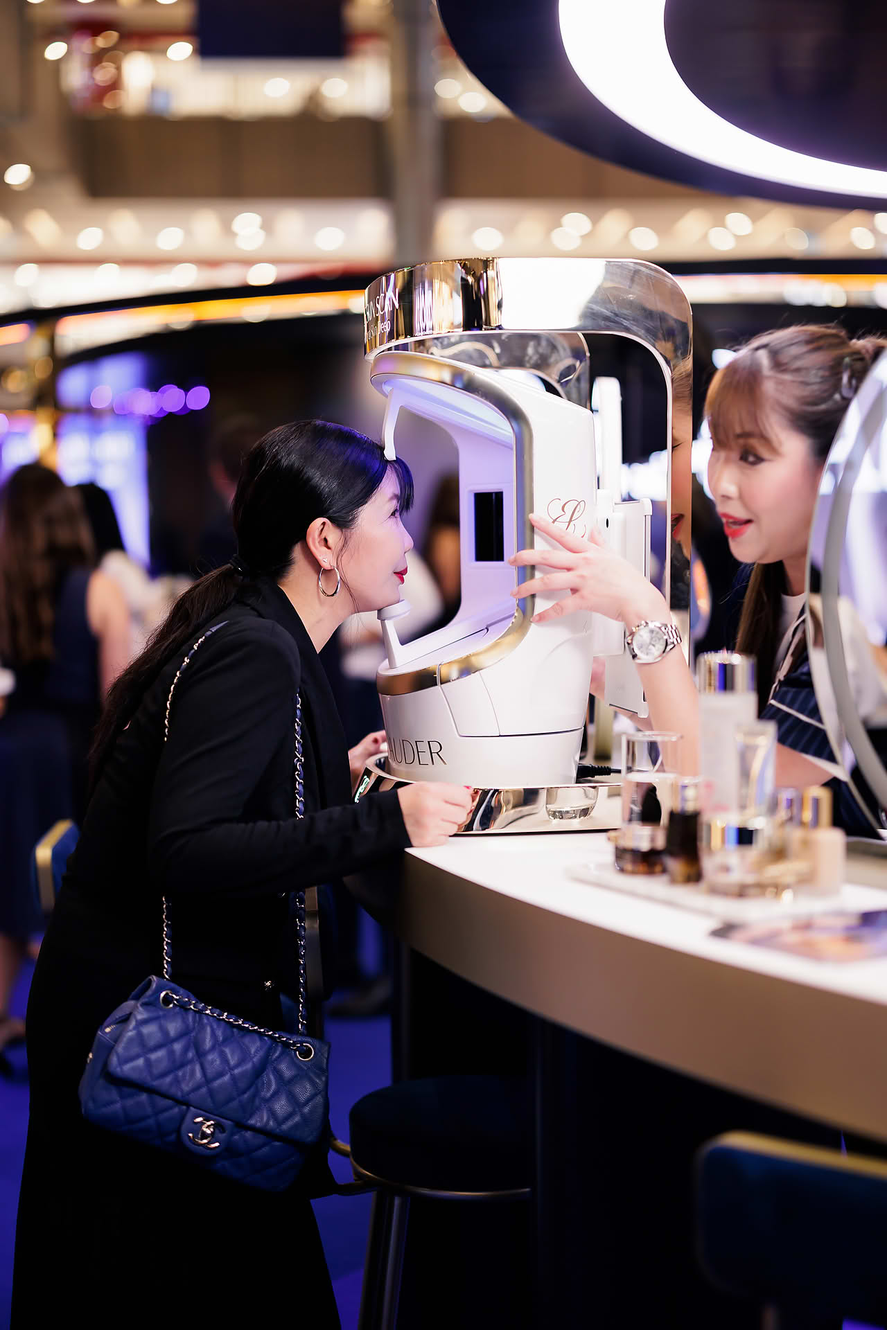 Guest trying Estee Lauder treatment during Yoona PR event in Paragon