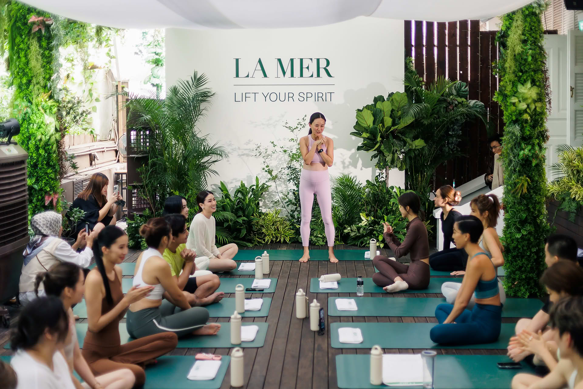 Influencers doing yoga at La Mer WCD