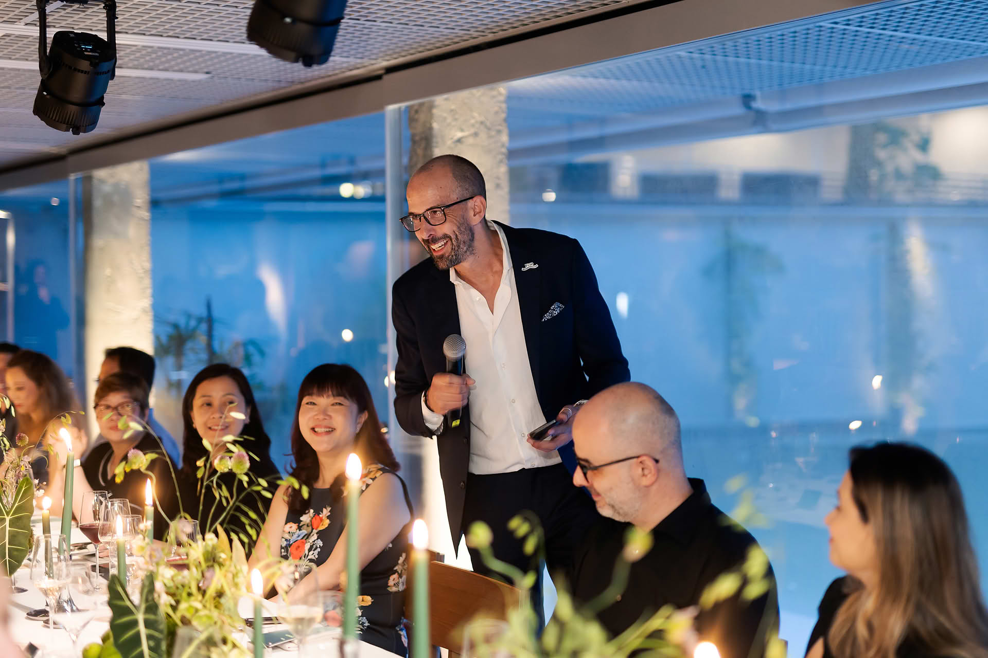 Host interacting with guest at Amex 1850
