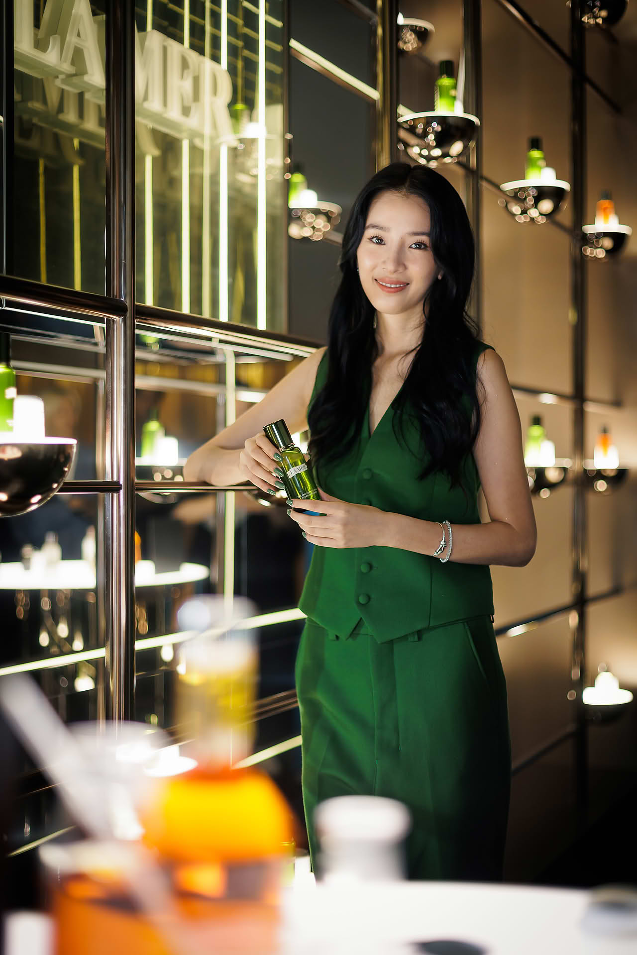 Influencer posing with product at La Mer WCD PR event