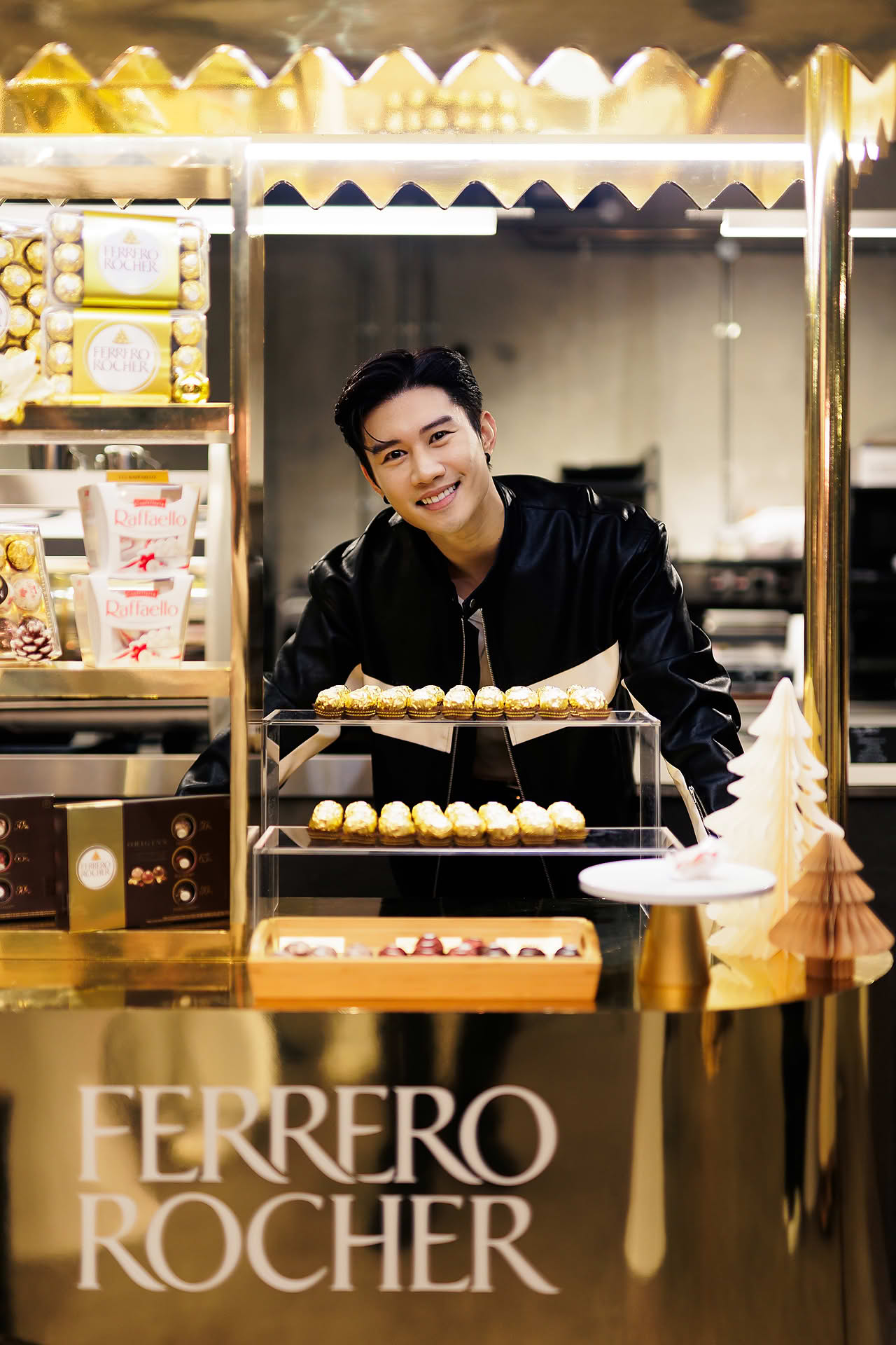 Influencer posing at Ferrero Rocher stall cart