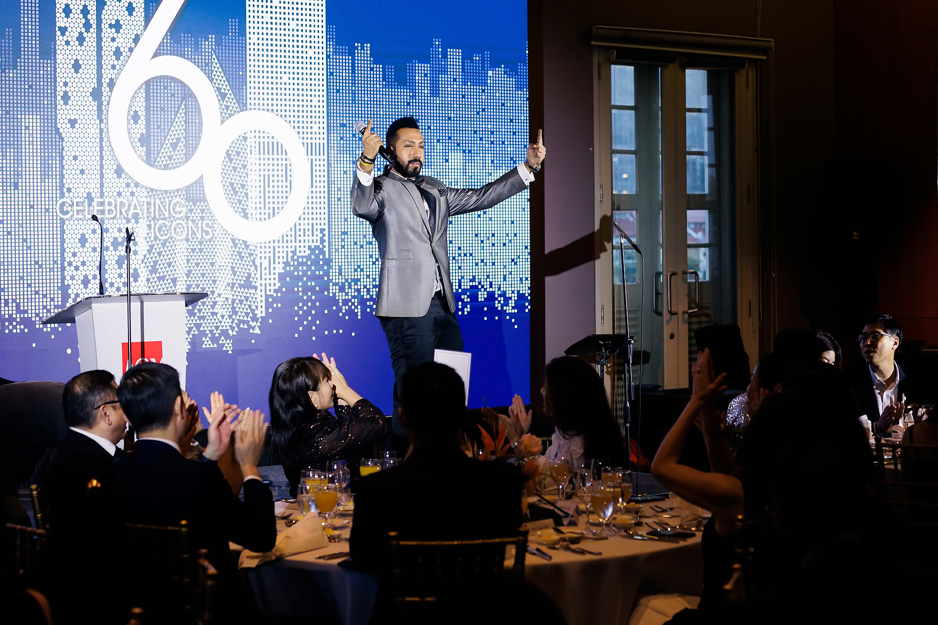 Emcee hosting at SG Land dance and dinner party