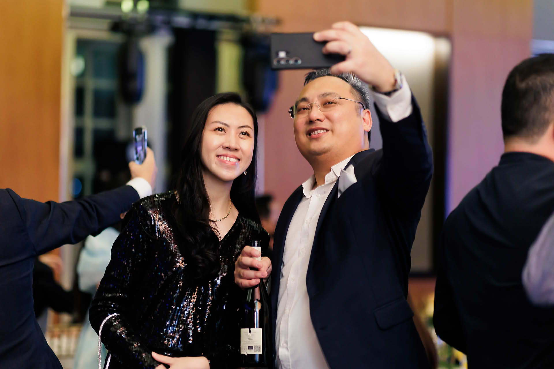 People taking photo at SG Land dance and dinner party