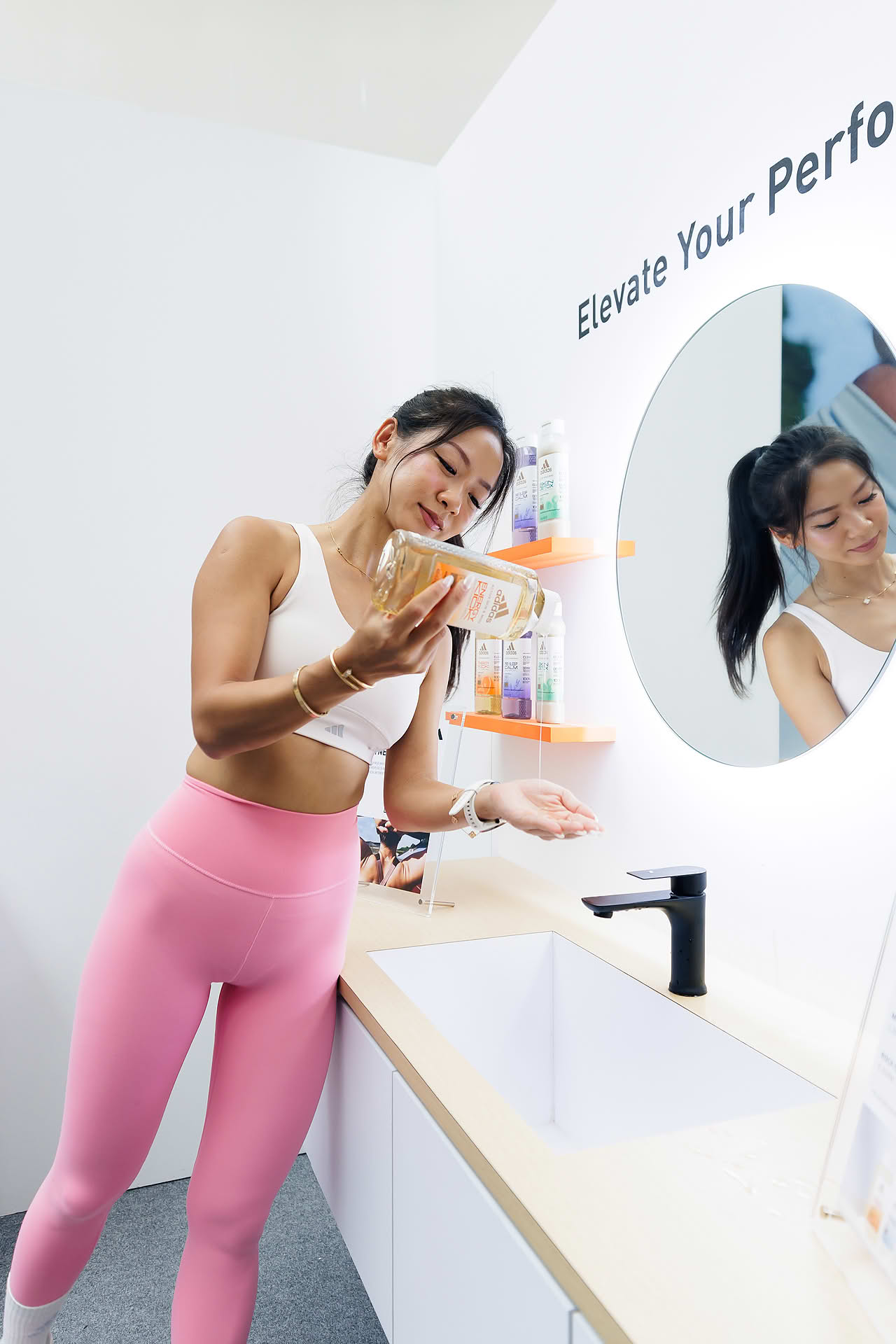 Influencer using product at Adidas Pop-up stall