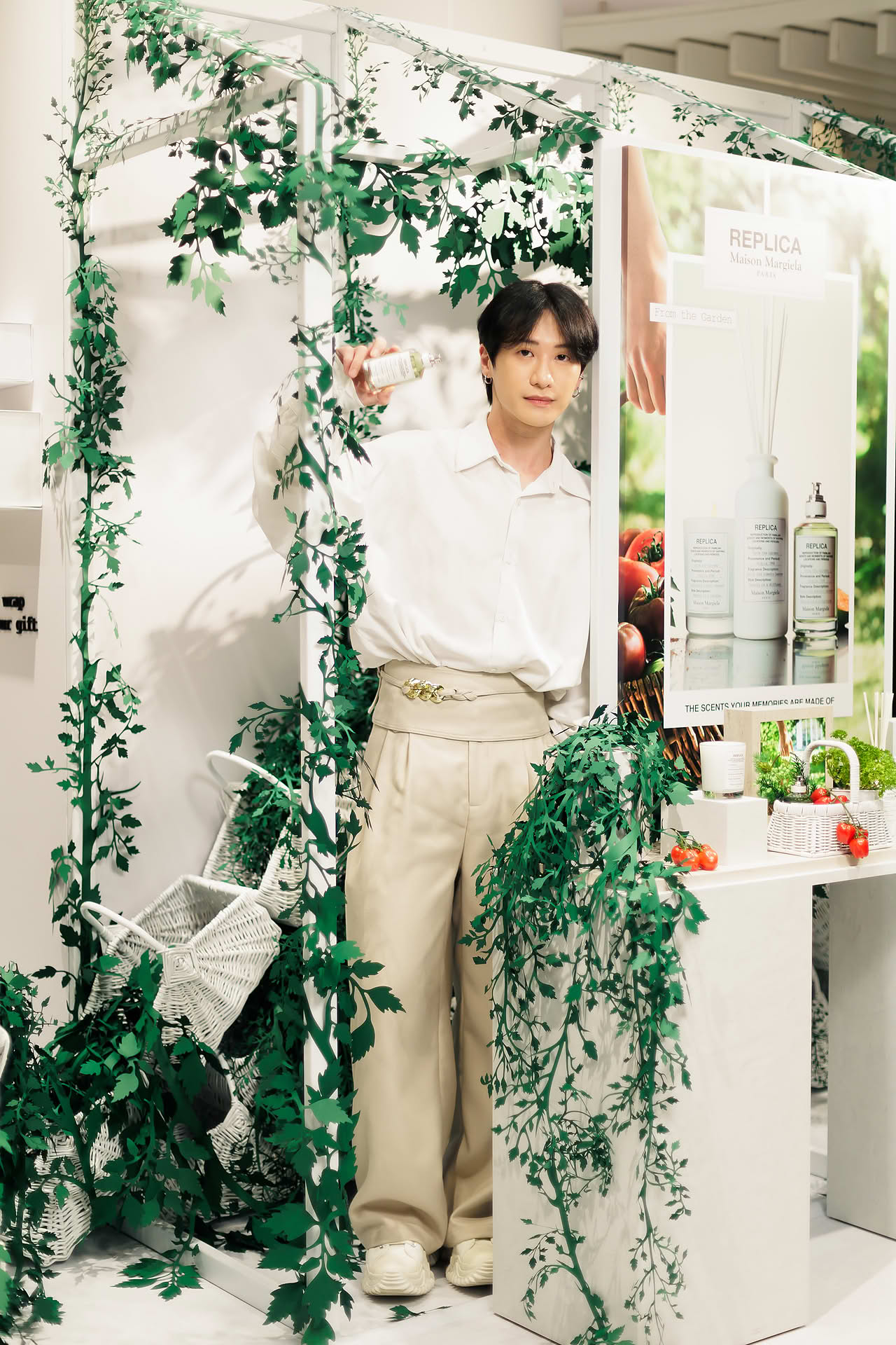 Influencer posing with Maison Margiela Replica for PR event at Ngee Ann City