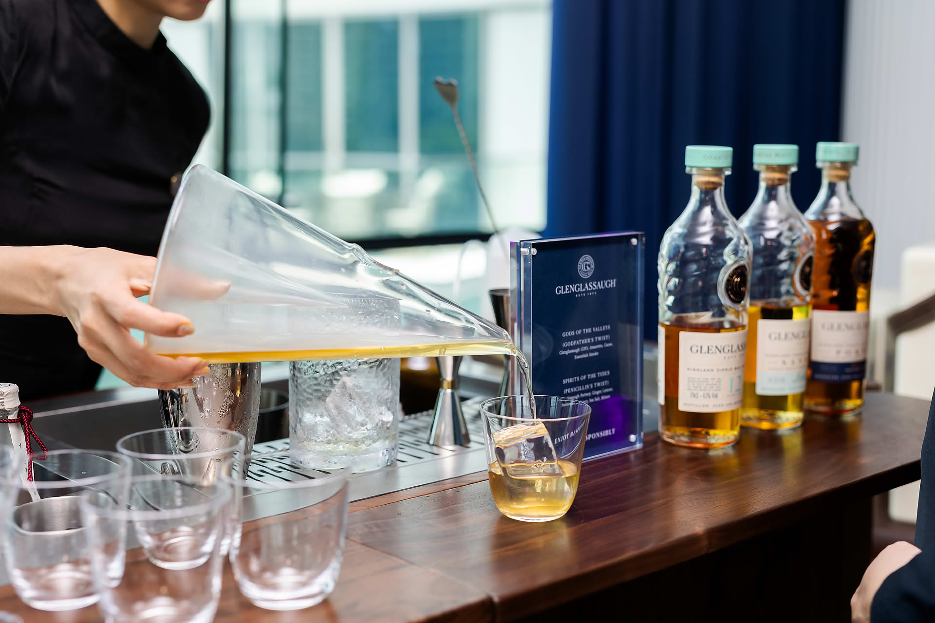 Drinks being prepared by bartender at Glenglassaugh PR event