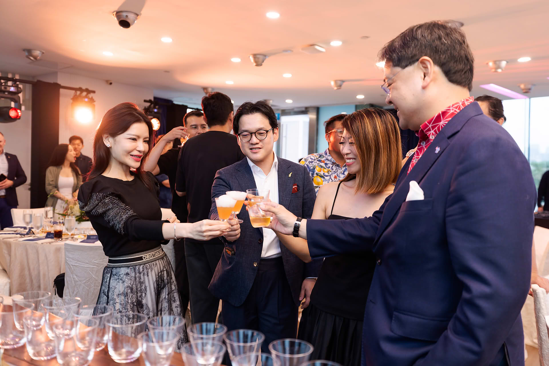 Guest toasting their drinks at Glenglassaugh PR event