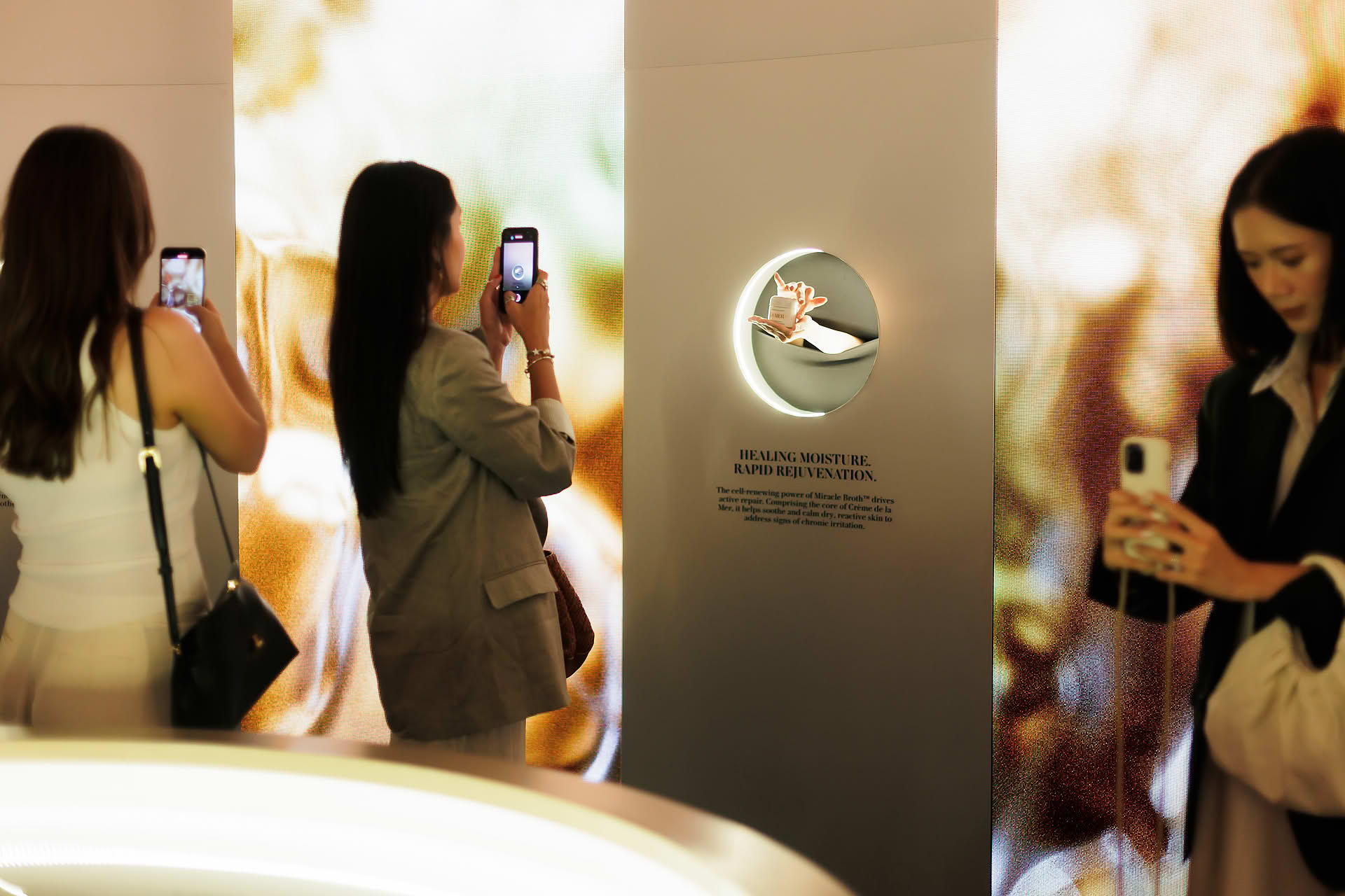 Crowd enjoying immersive display zone at La Mer WCD PR event