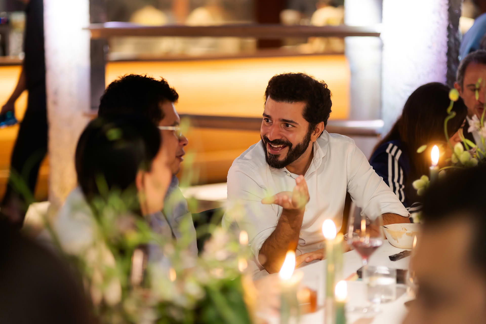 Guest talking happily at Amex 1850