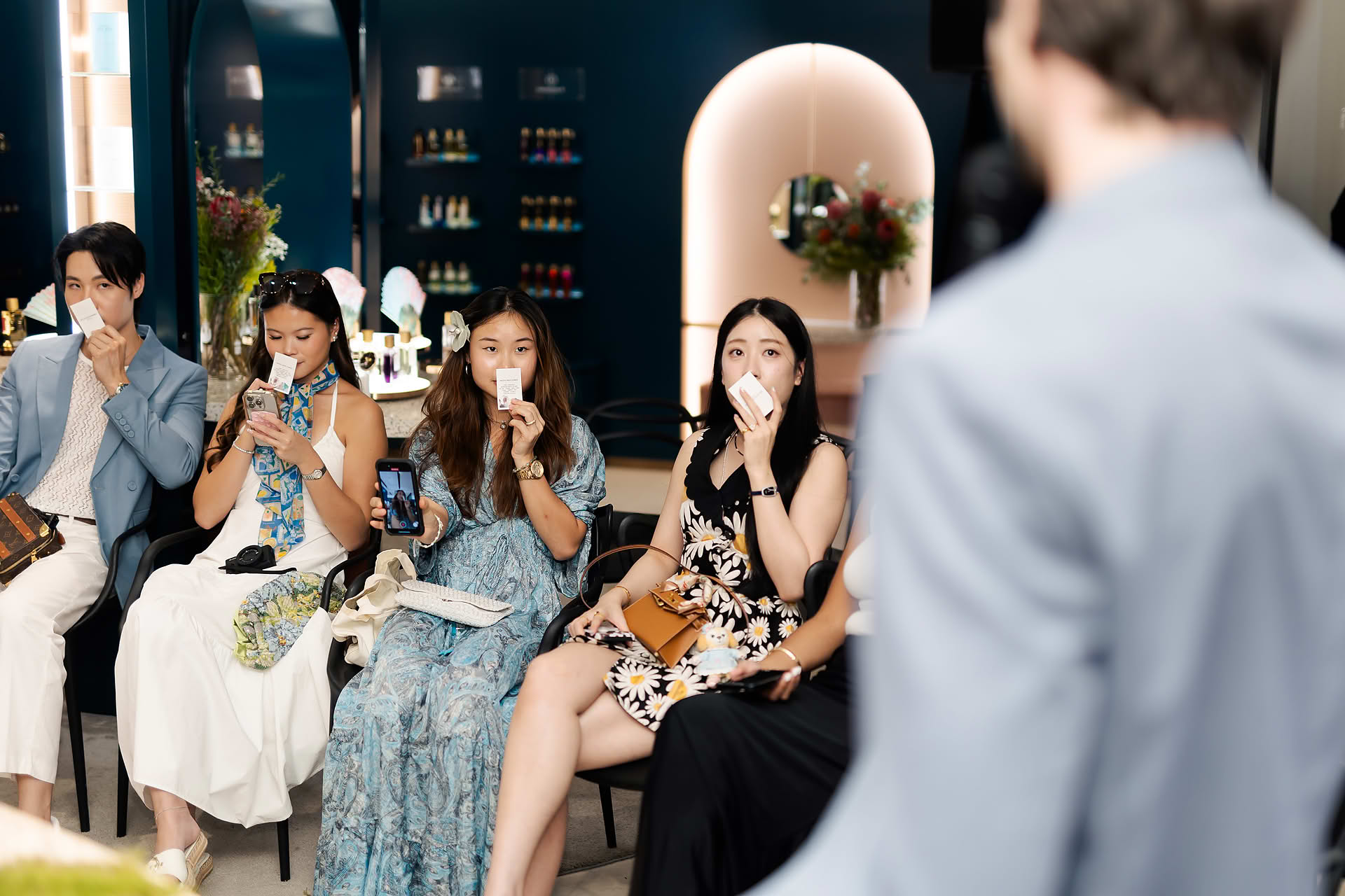 Guests smelling perfume at Goldfield & Banks PR event