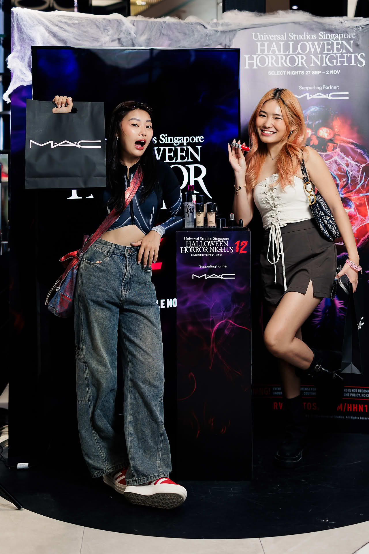 Influencers posing at MAC Cosmetics Halloween event