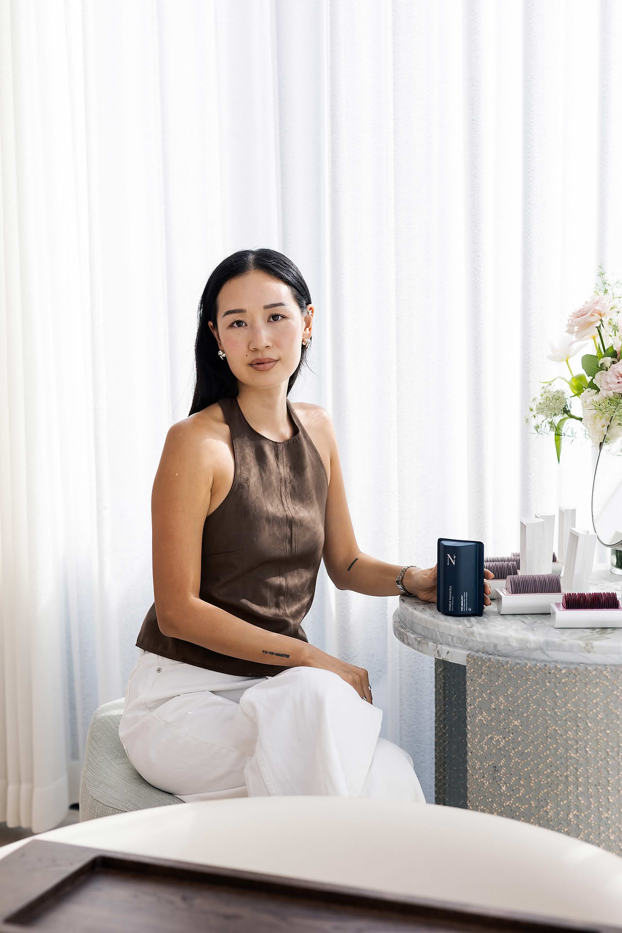 KOL posing for photo at Noble Panacea PR event