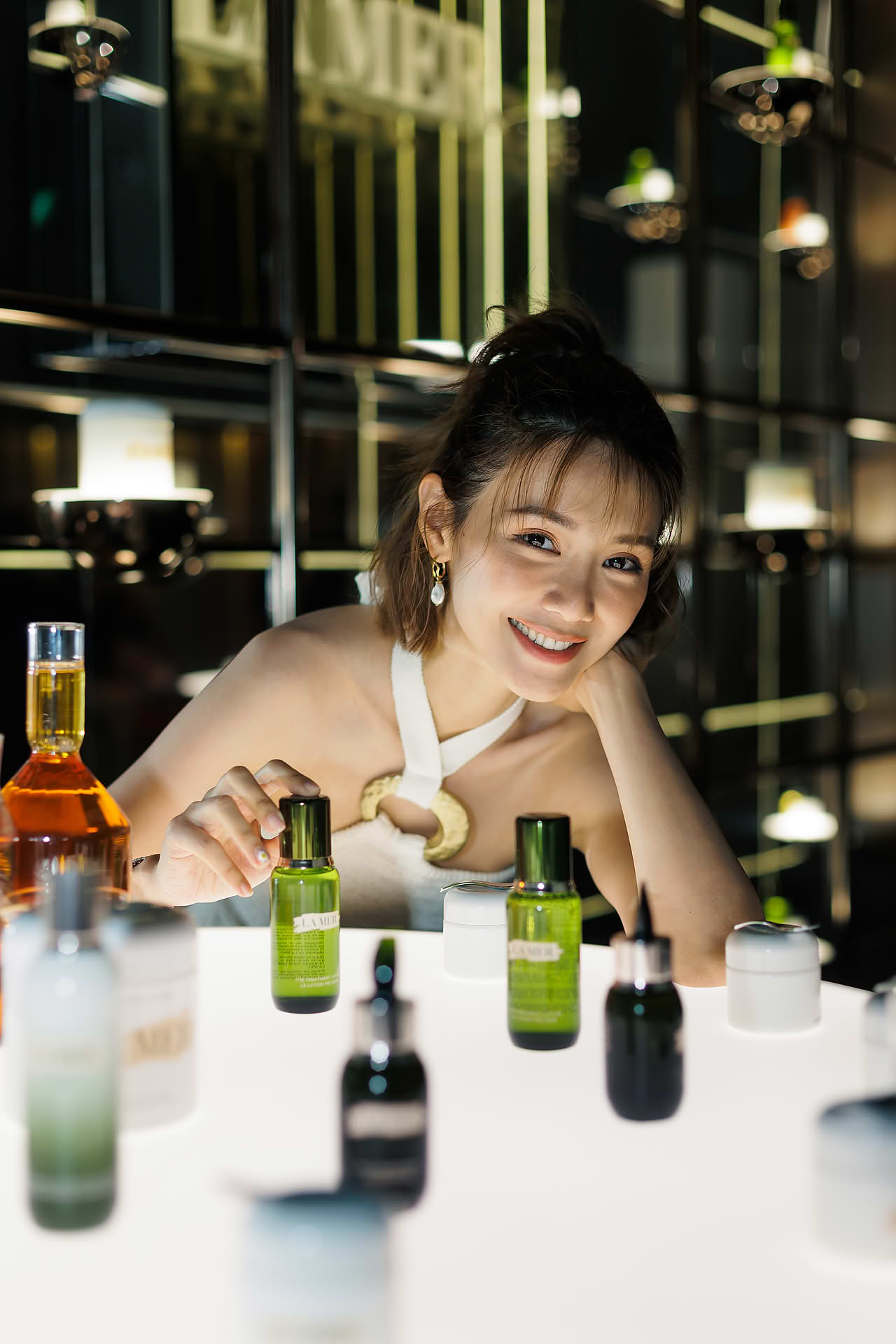 Influencer posing with product at La Mer WCD PR event