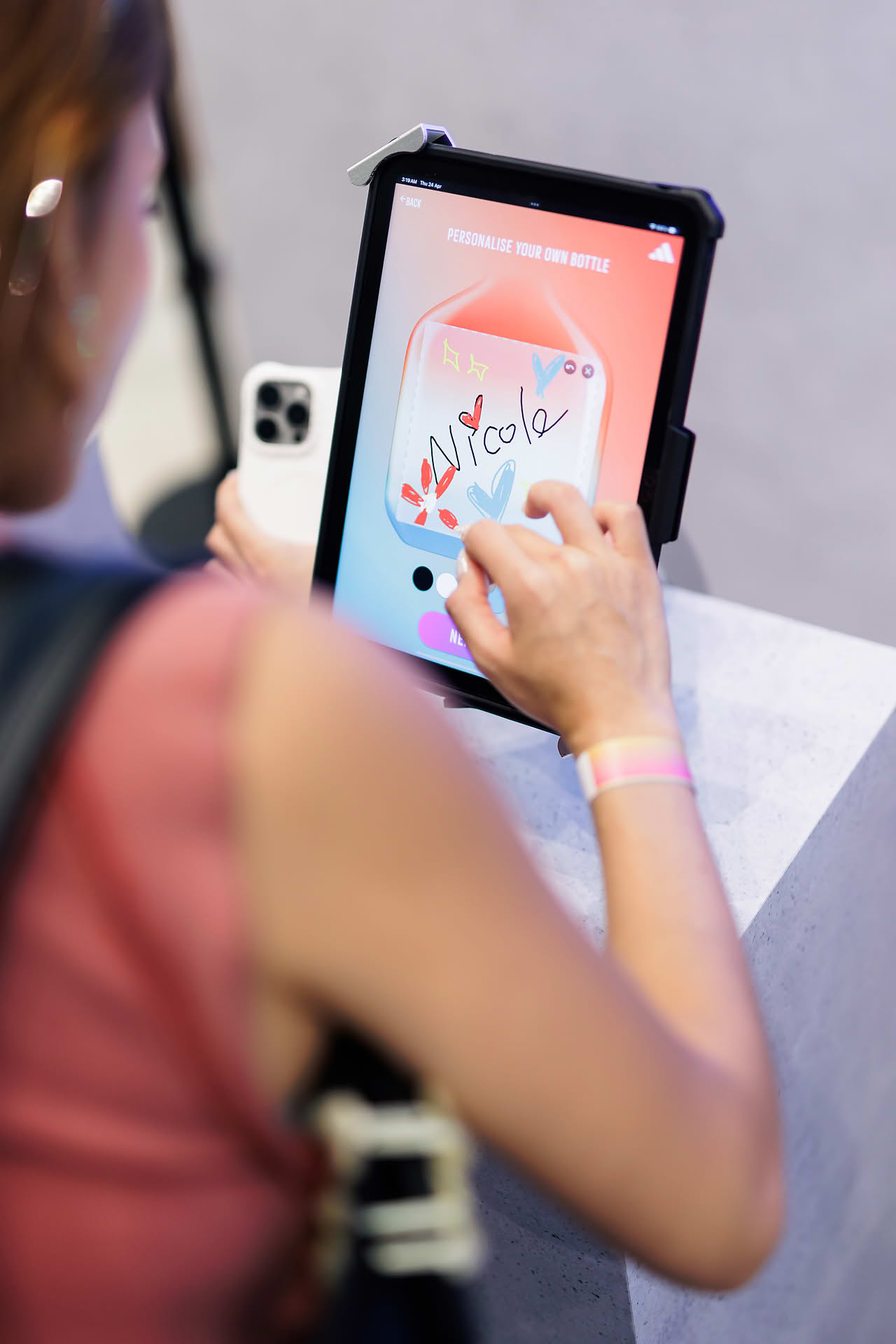 Srceen of interactive kiosk at Addidas Vibe pop-up stall in Plaza Singapura