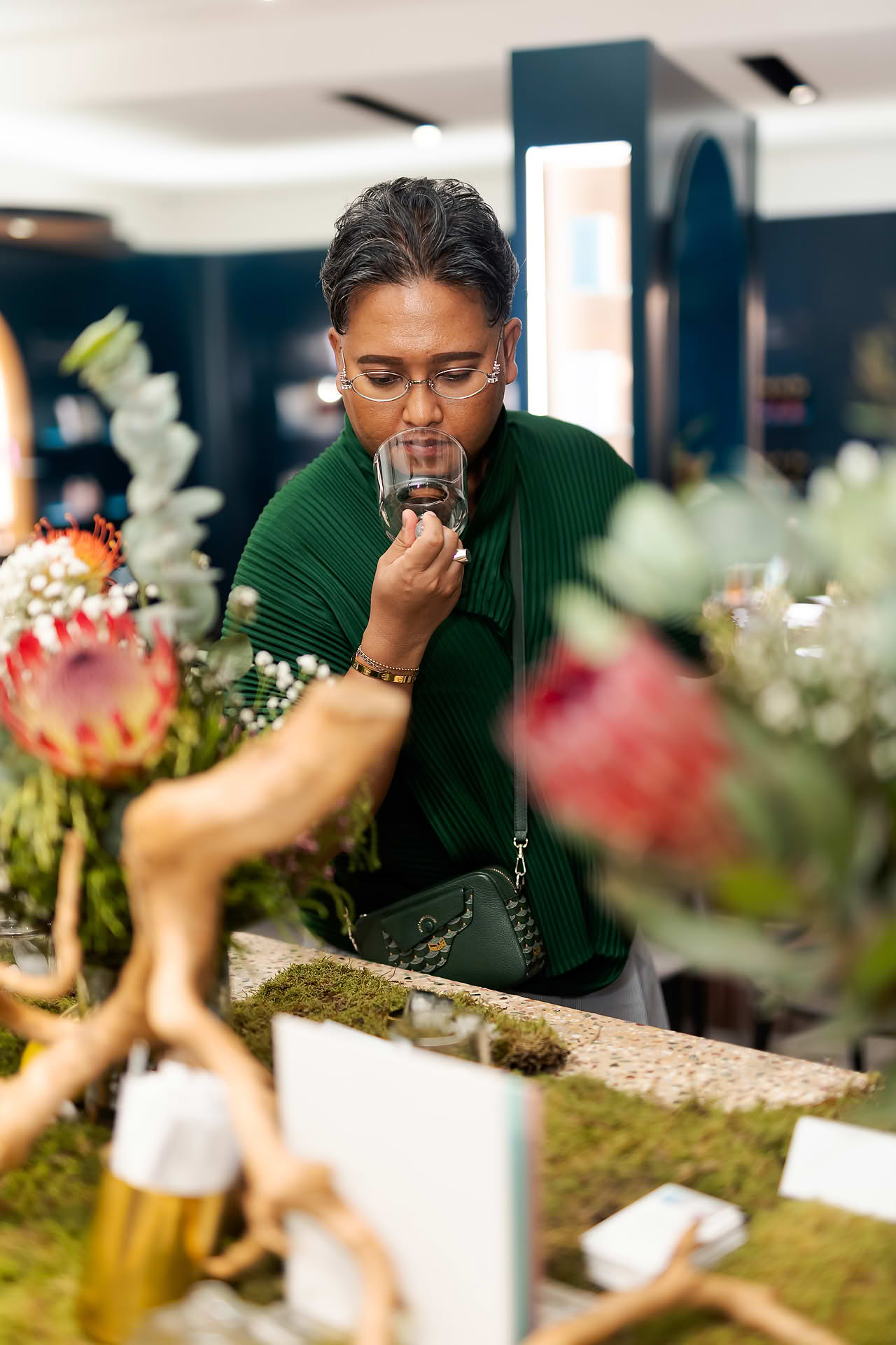Guest smelling perfume at Goldfield & Banks PR event