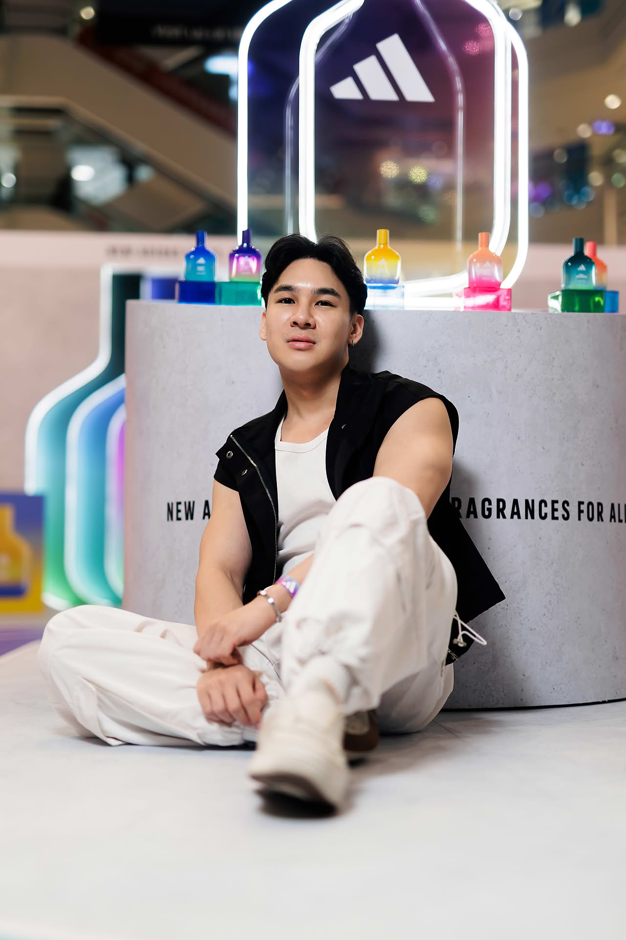 Influencer posing at Addidas Vibe pop-up stall in Plaza Singapura