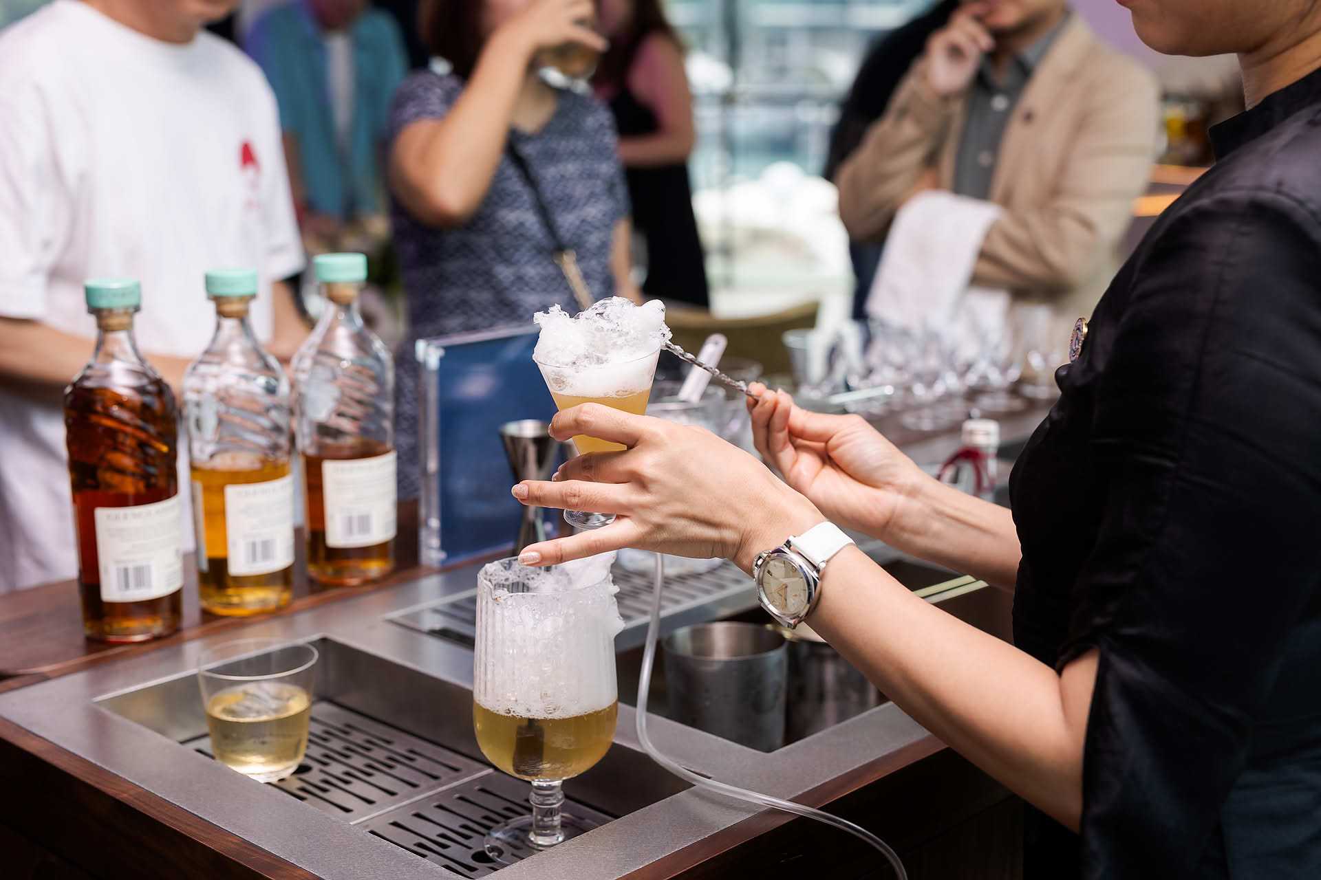 Drinks being prepared by bartender at Glenglassaugh PR event