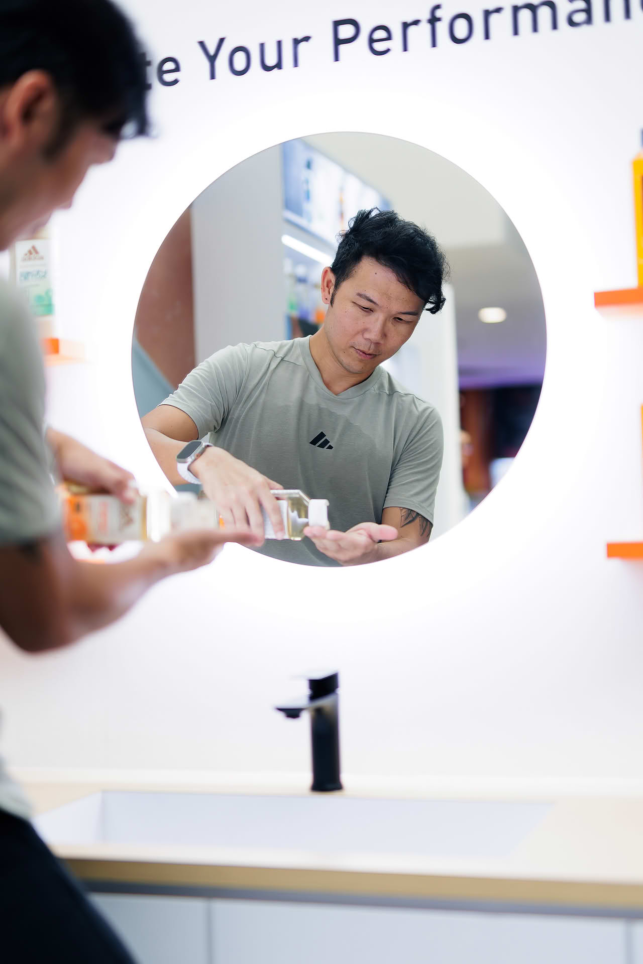 Influencer using product at Adidas Pop-up stall