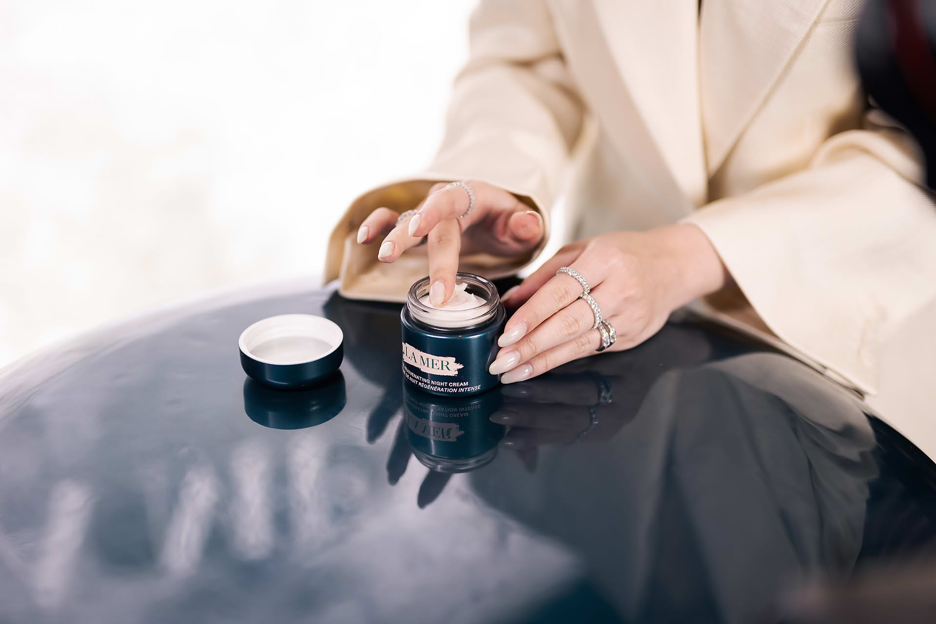 Guest trying hand cream at La Mer One Night event