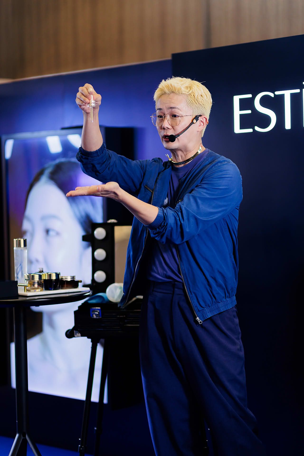 Makeup artist teaching at Estee Lauder PR event