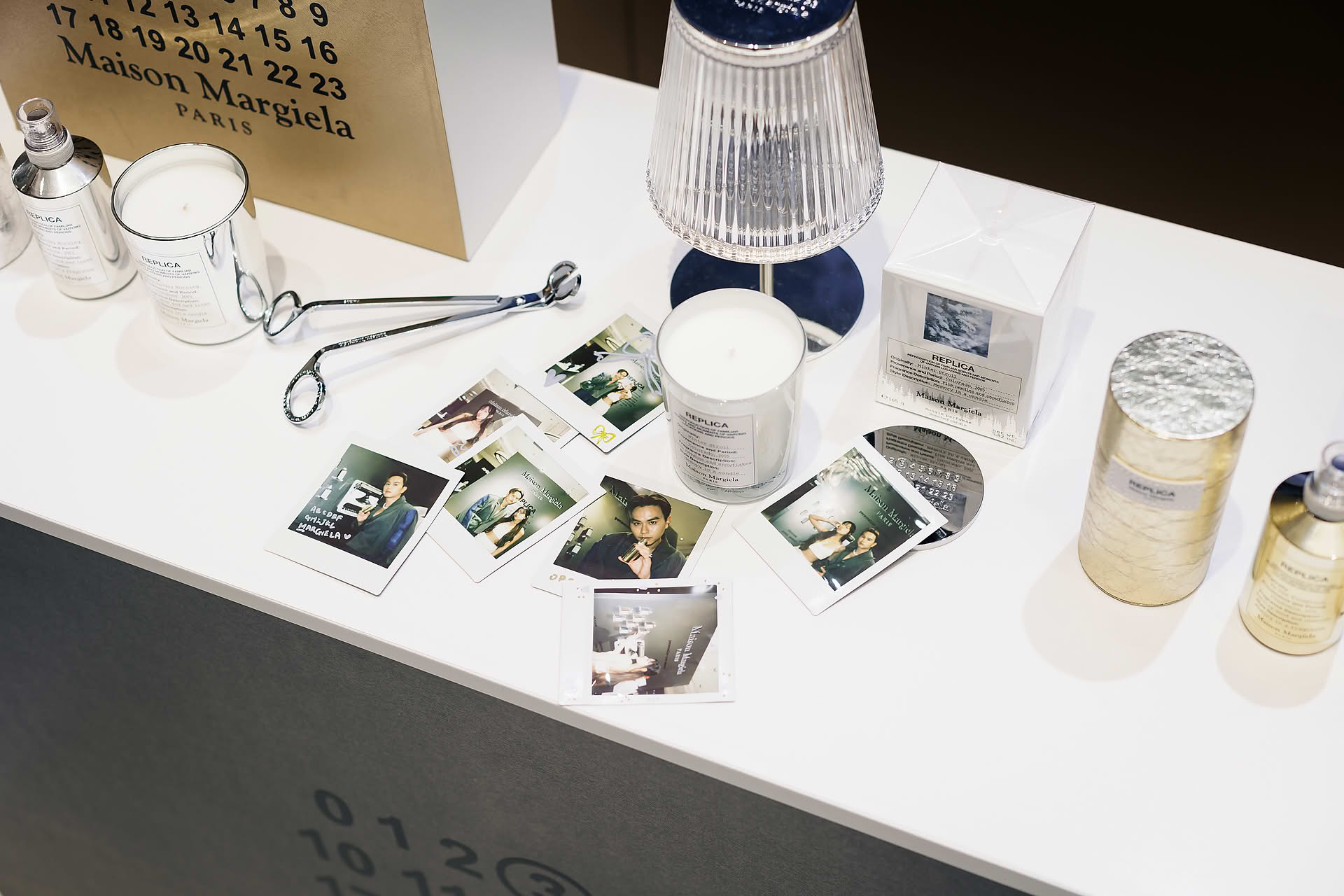 Polariod photos taken at Maison Margiela pop-up stall in Ngee Ann City