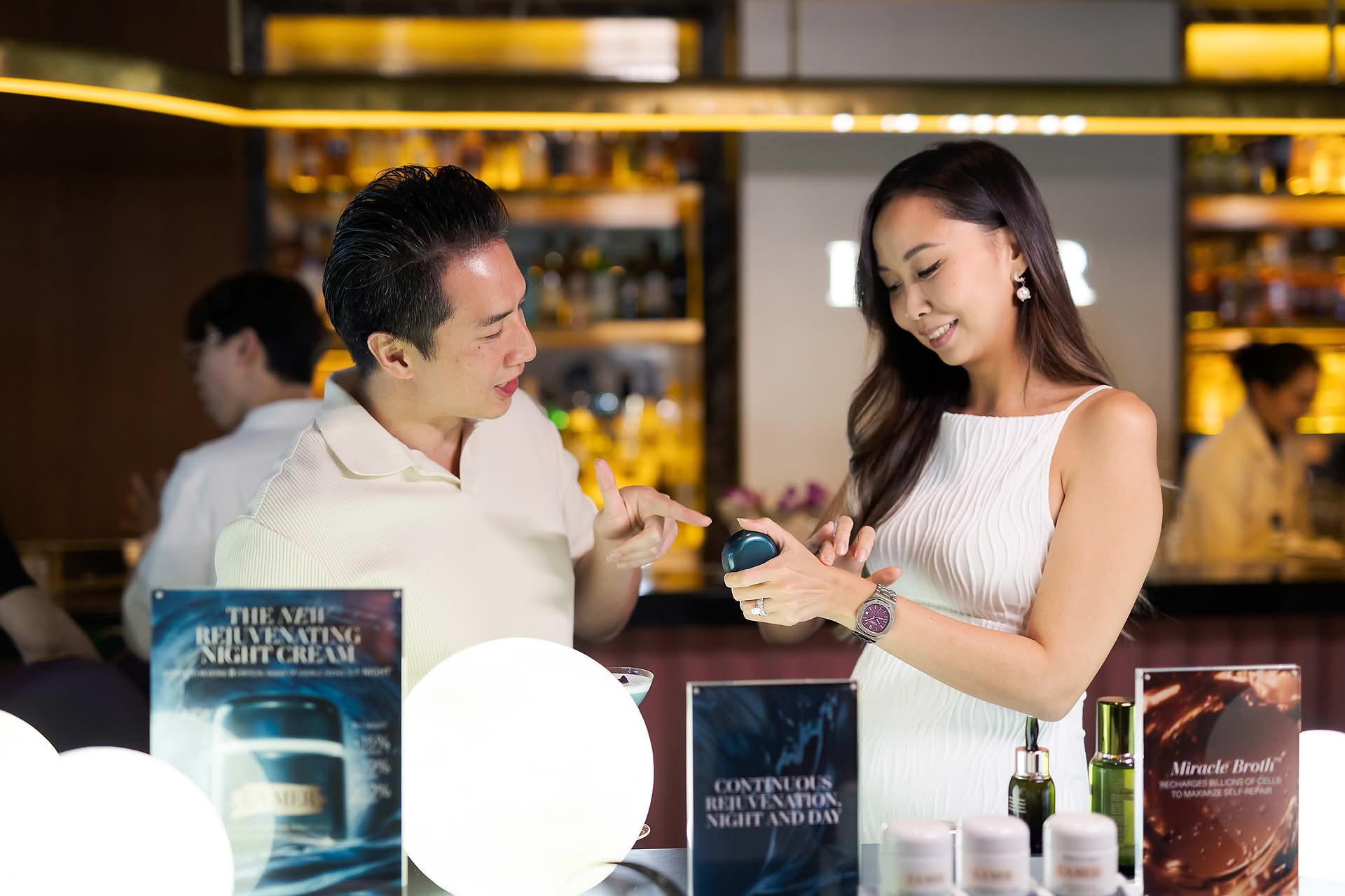 Guest trying hand cream at La Mer One Night event