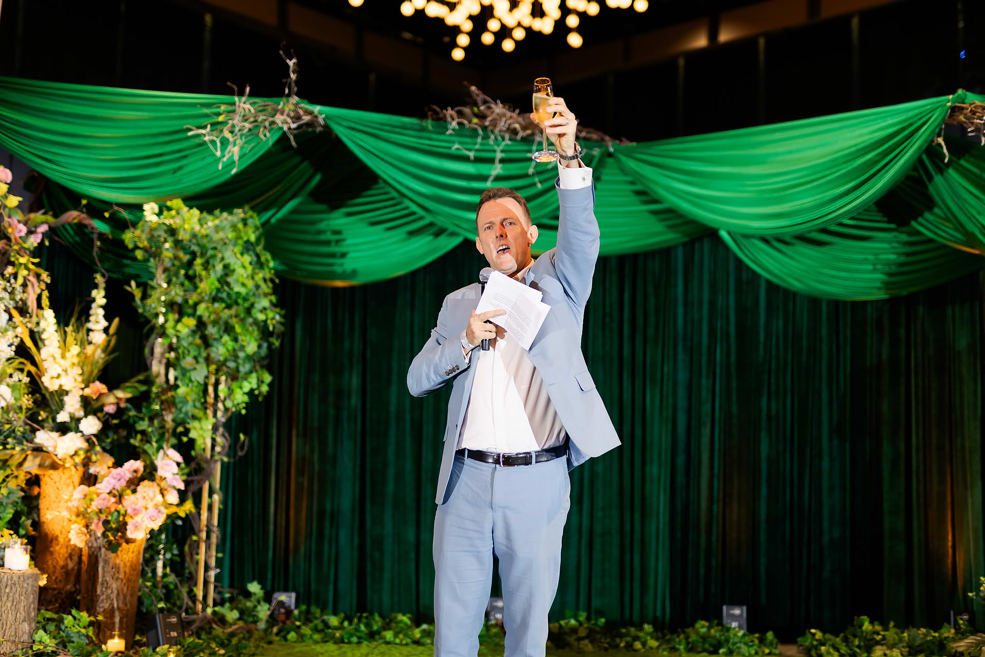 Boss giving a toast at CT Partners company retreat in Singapore
