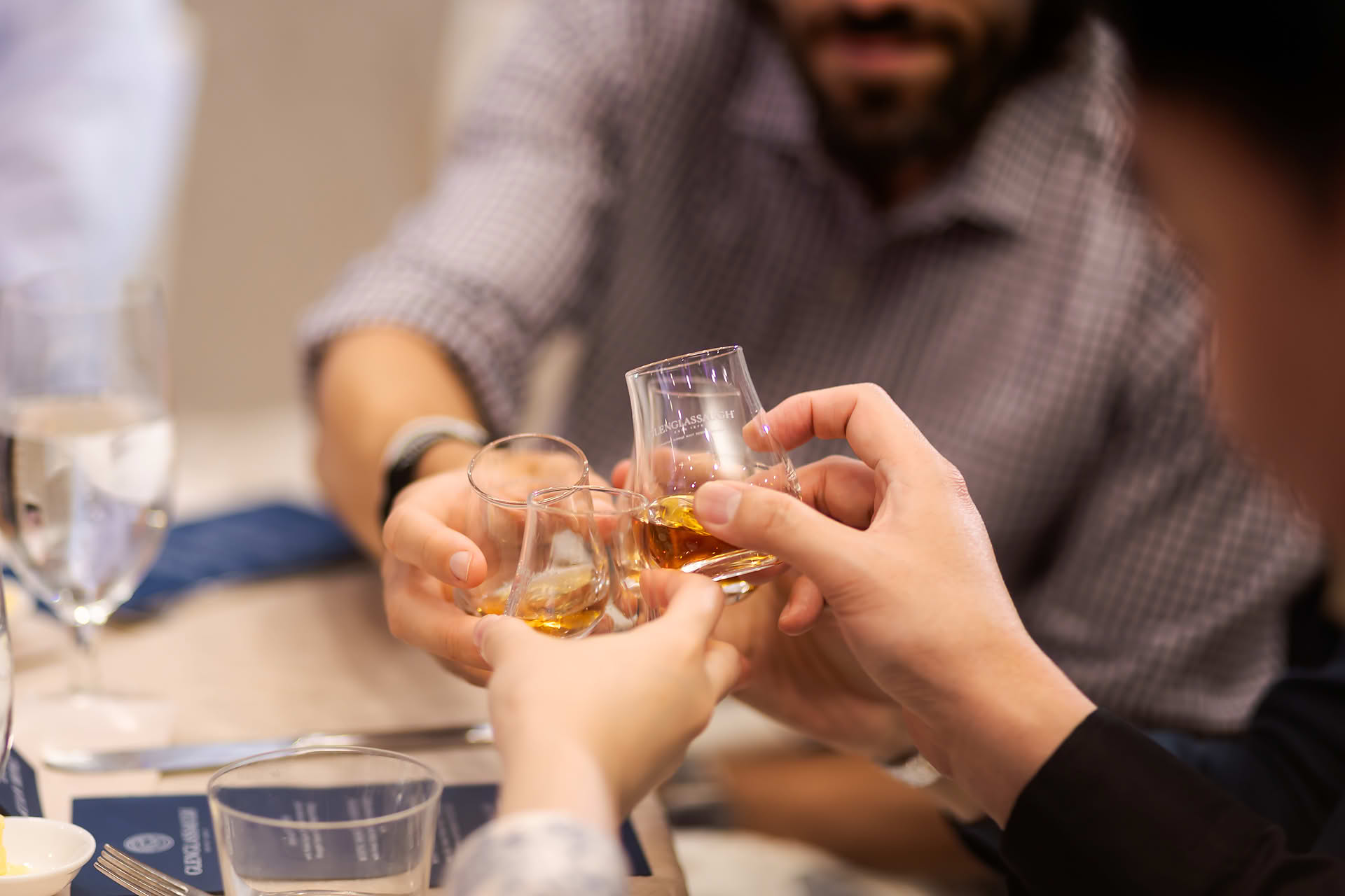 Guest clink glasses at Glenglassaugh PR event
