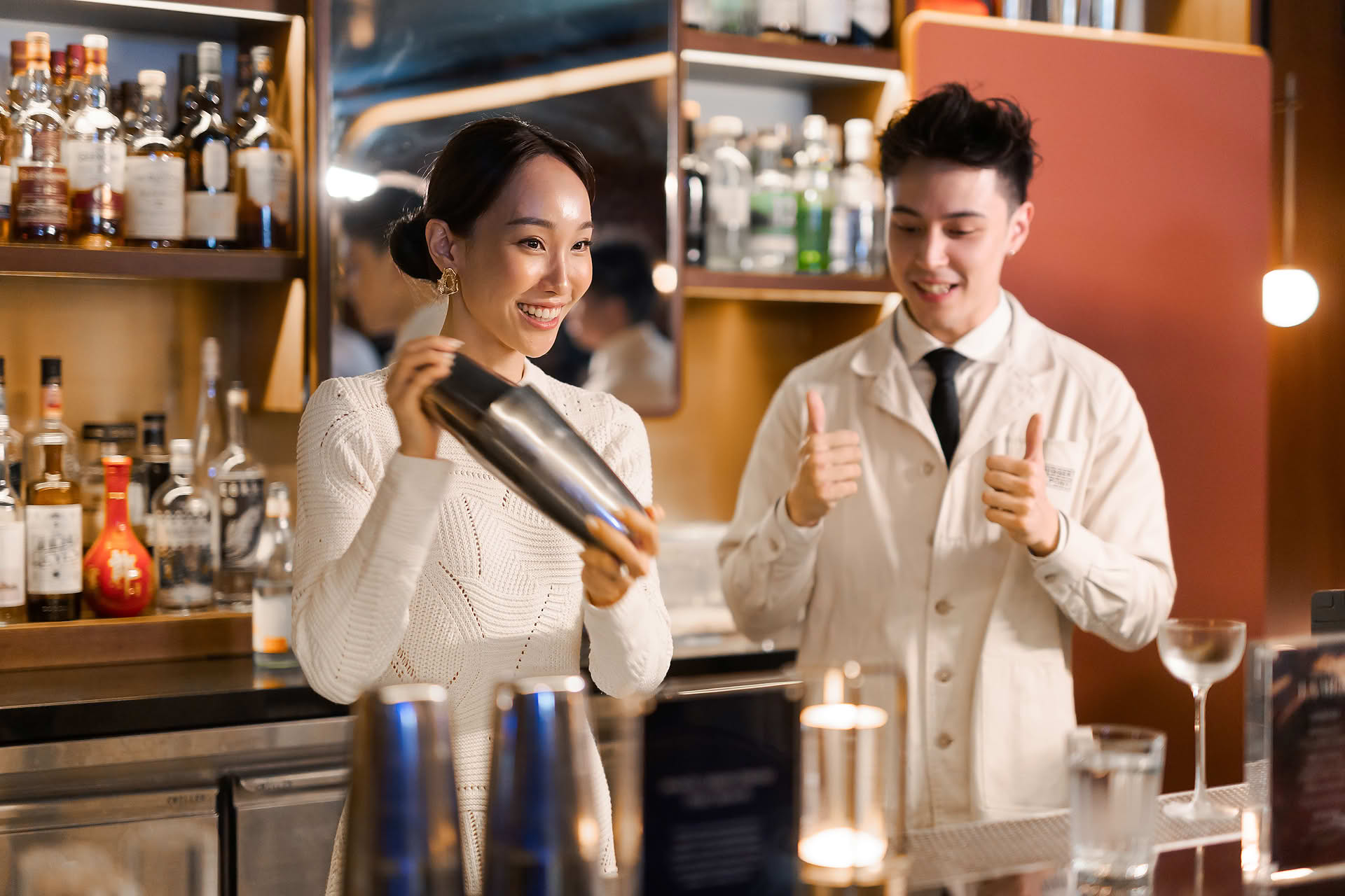 Celebrity making own drink at La Mer One Night event