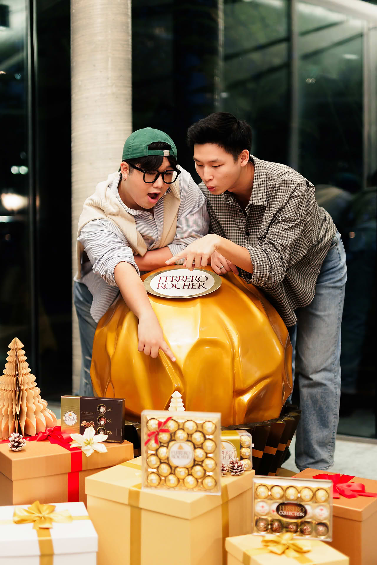 Influencer posing with Ferrero Rocher decorations