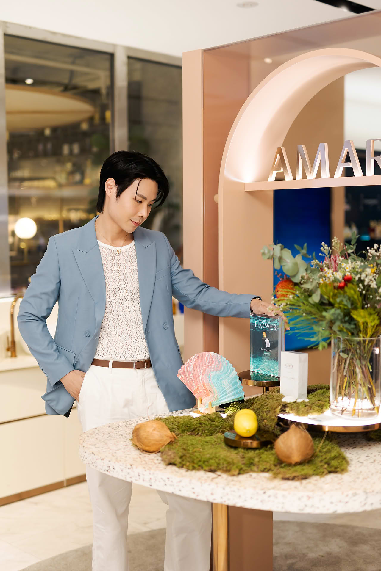Influencer looking at product displayat Goldfield & Banks PR event