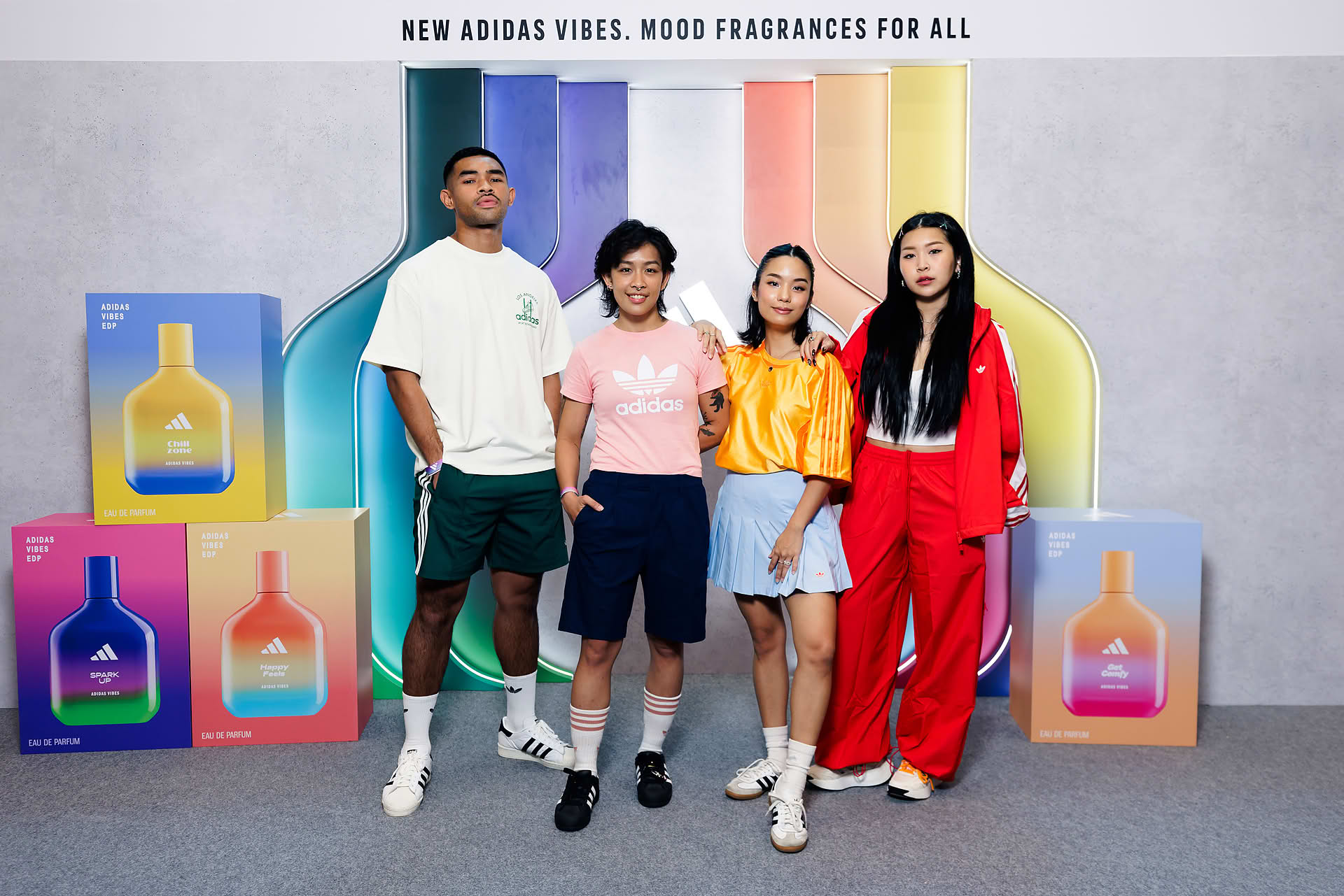 Influencers taking group photo at Addidas Vibe pop-up stall in Plaza Singapura